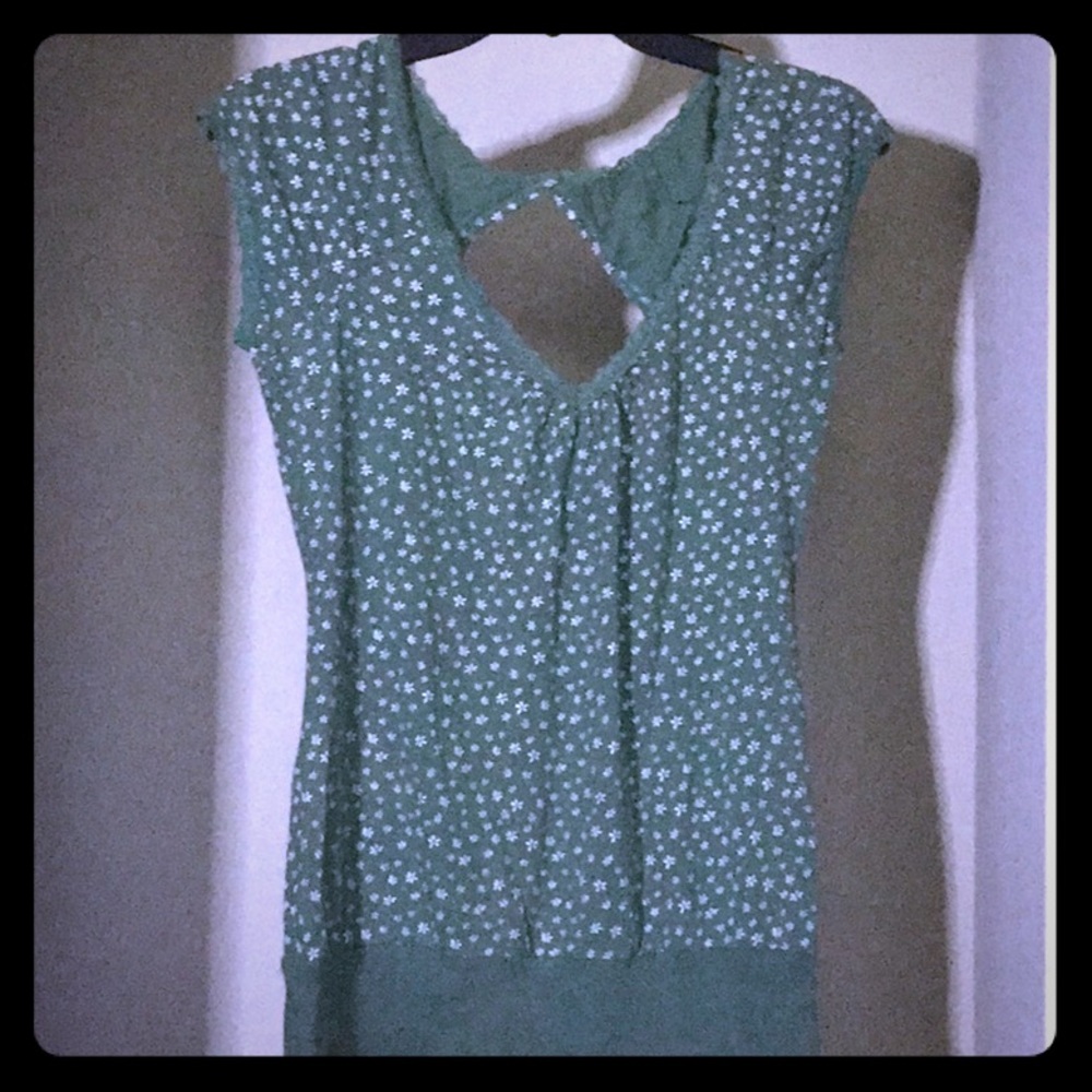 Green blouse with small white flowers printed